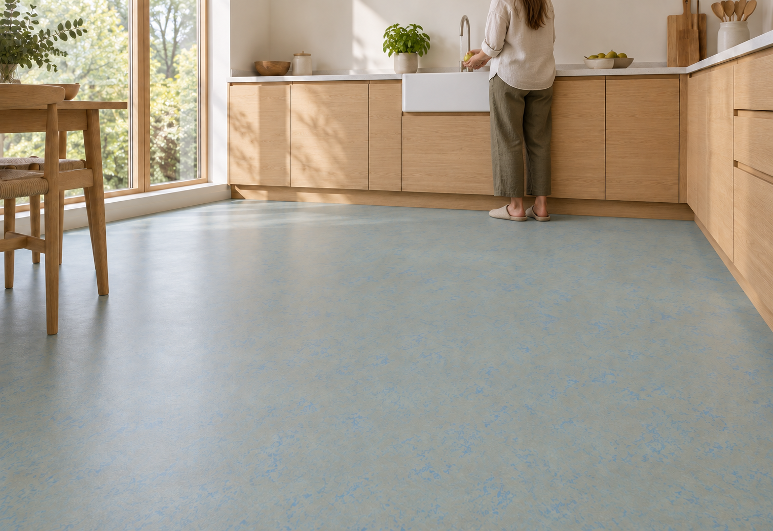 Forbo Marmoleum Blue Shimmer with woman in the kitchen